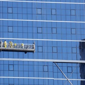 Window cleaner and maintenance on the outside of a skyscraper